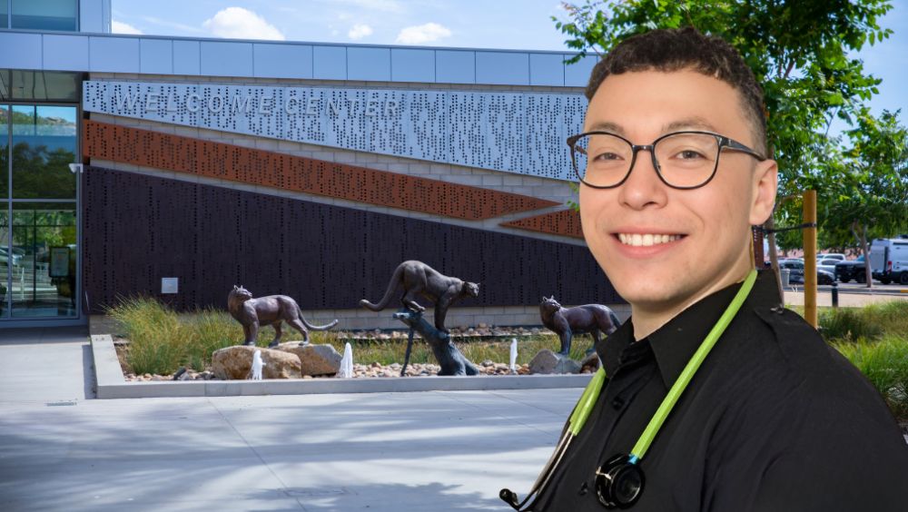 Portrait of John Paul Rosales in front of Welcome Center building