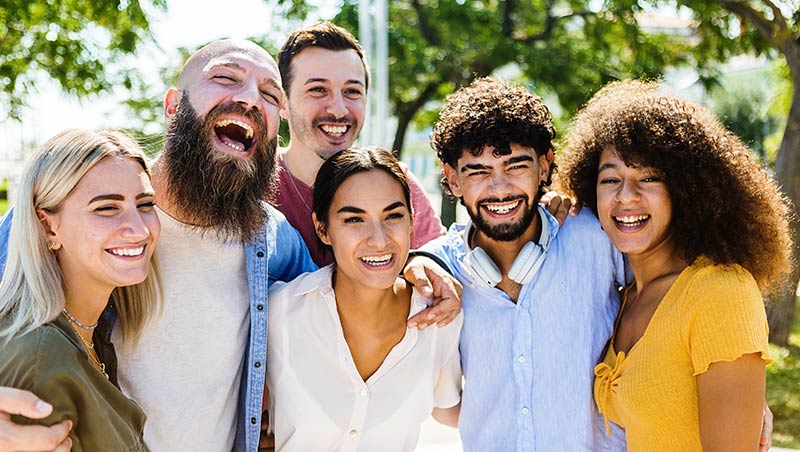 Group of happy adult students at different life stages