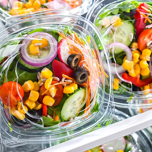 Pre-made salads in clear plastic containers