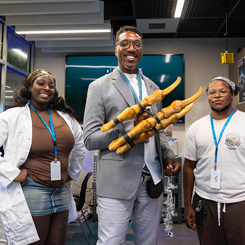 The iMAKE staff show off student creations